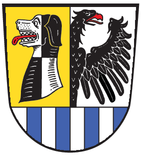Wappen des Landkreises in den Farben Gelb, Blau, Schwarz, Weiß, Hund und Reichsadler